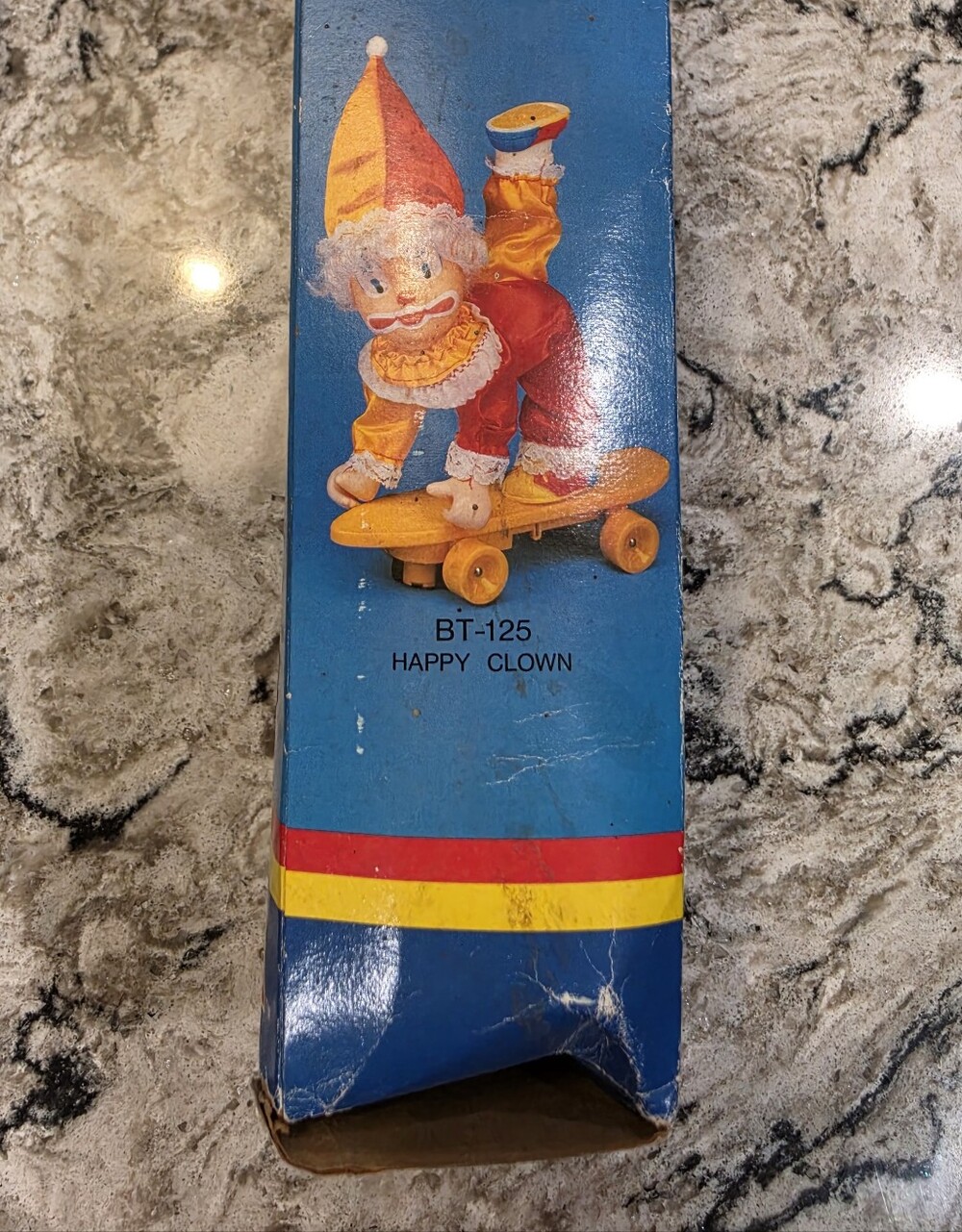 Happy Clown Skateboard Toy – Yellow & Red